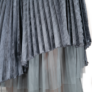 Pleated asymmetric layered midi skirt